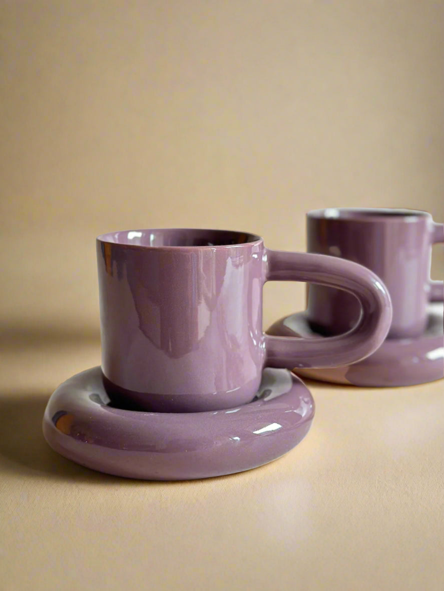 a couple of cups sitting on top of each other