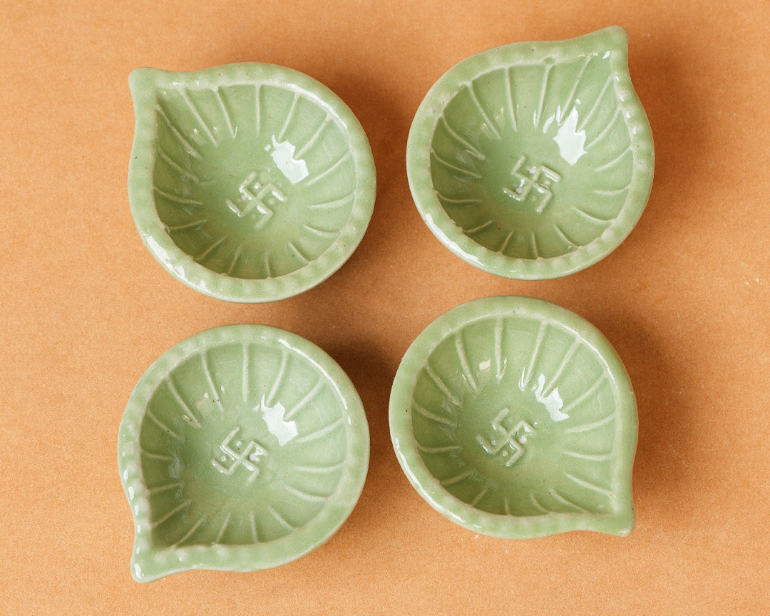 Green Swastik Clay Diyas - Set of 4
