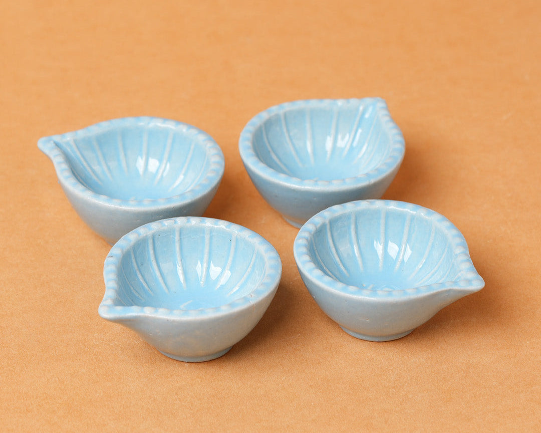 Sky Blue Swastik Clay Diyas - Set of 4