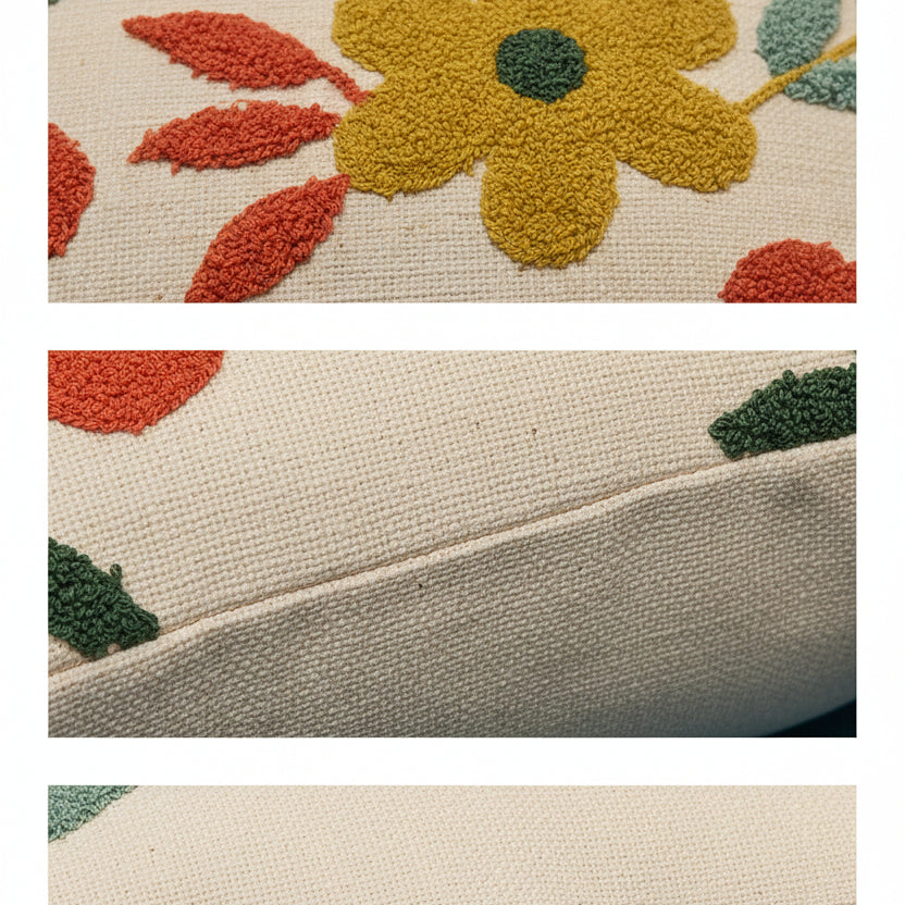 a blue couch with a floral pillow on top of it