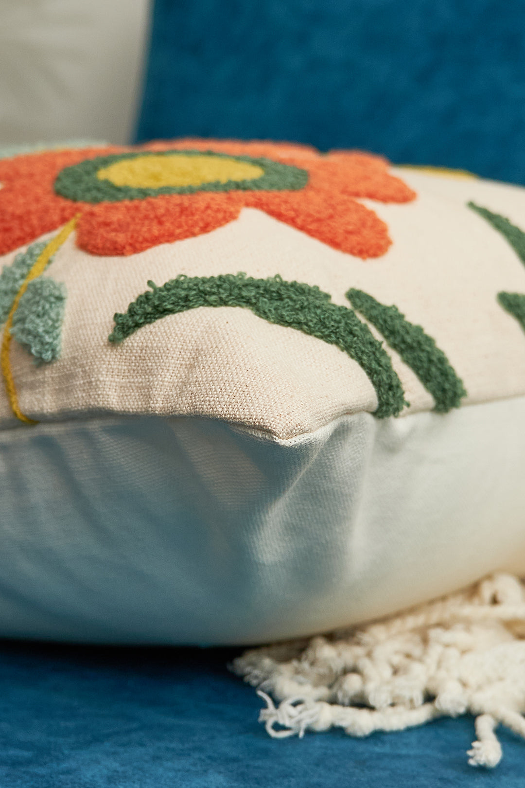 a close up of a pillow on a chair