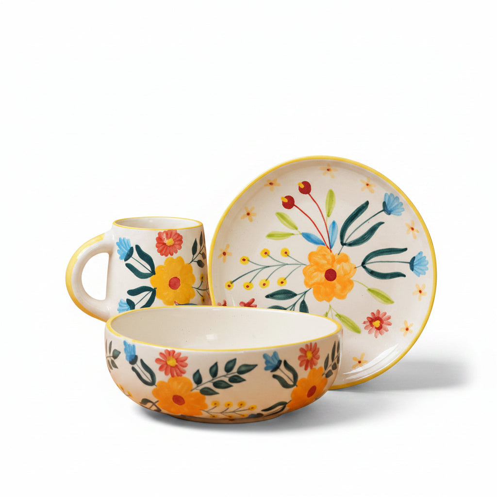 Ceramic tableware set with floral design on a brown background