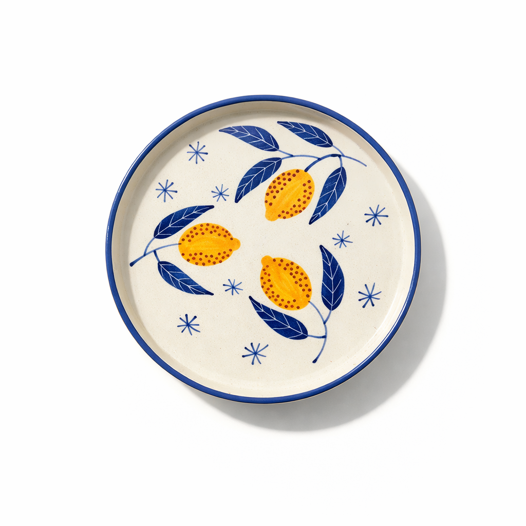 Decorative plate with lemon design on a white background