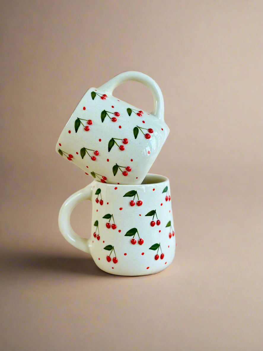 cherry mug embossed nurture india