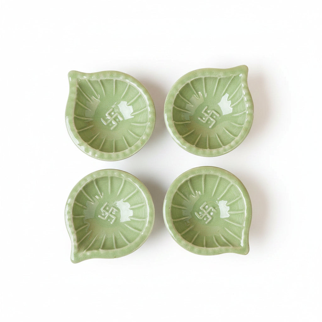 Green Swastik Clay Diyas - Set of 4