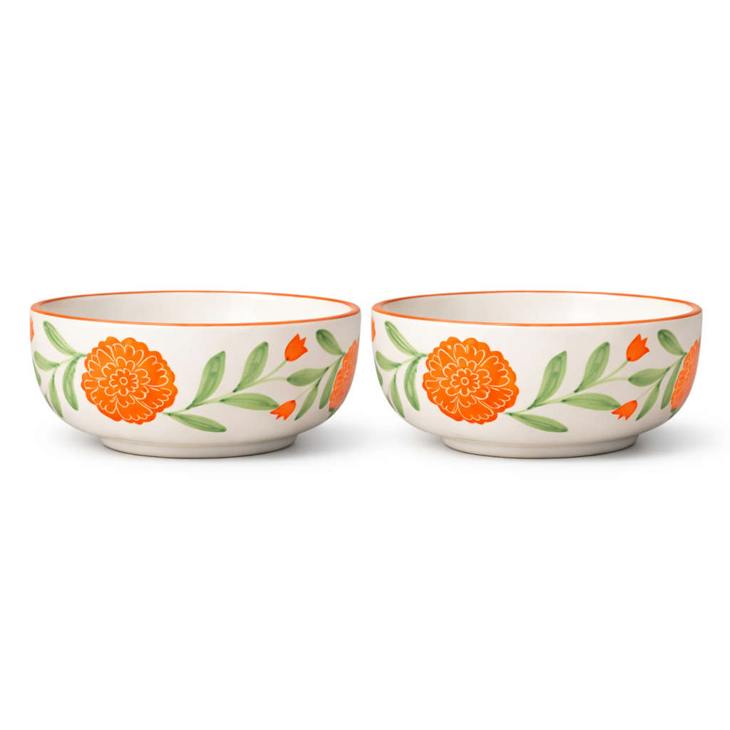 Two ceramic bowls with floral designs on a white background