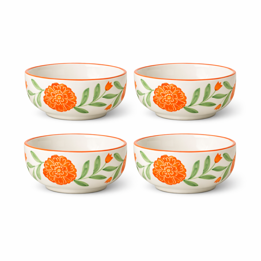 Four ceramic bowls with floral patterns on a white background