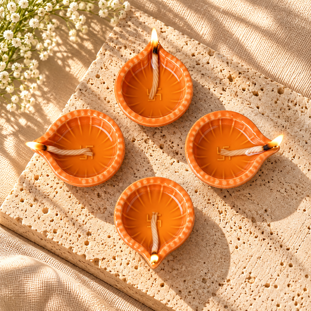 Orange Swastik Clay Diyas - Set of 4