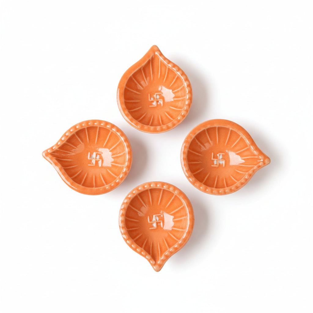 Orange Swastik Clay Diyas - Set of 4