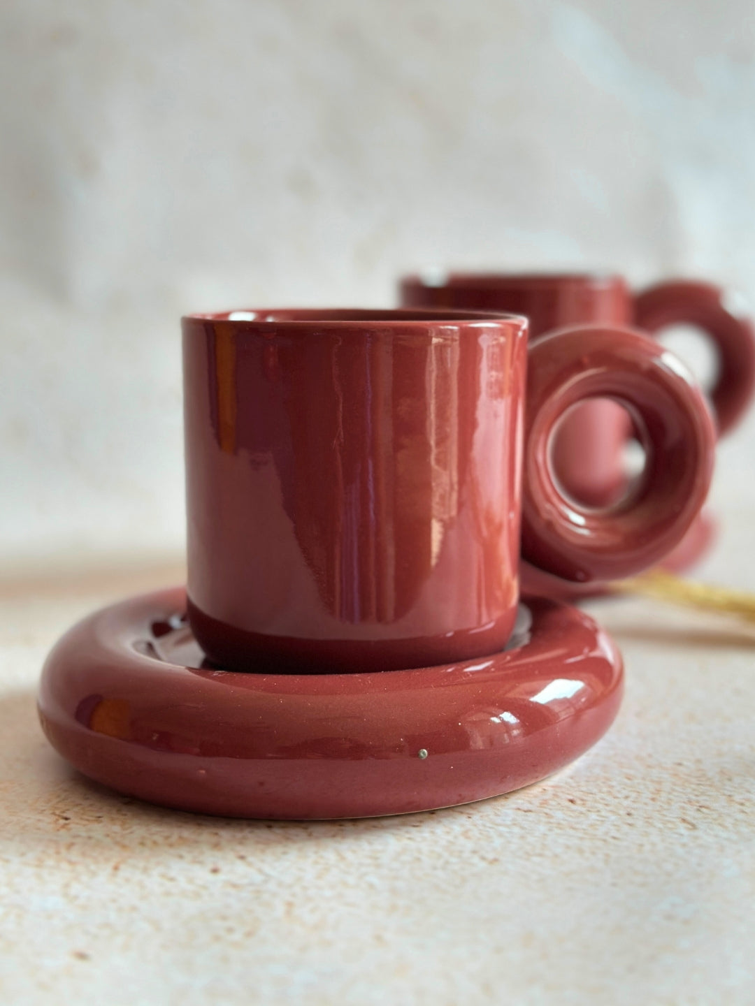 a couple of red cups sitting on top of a table