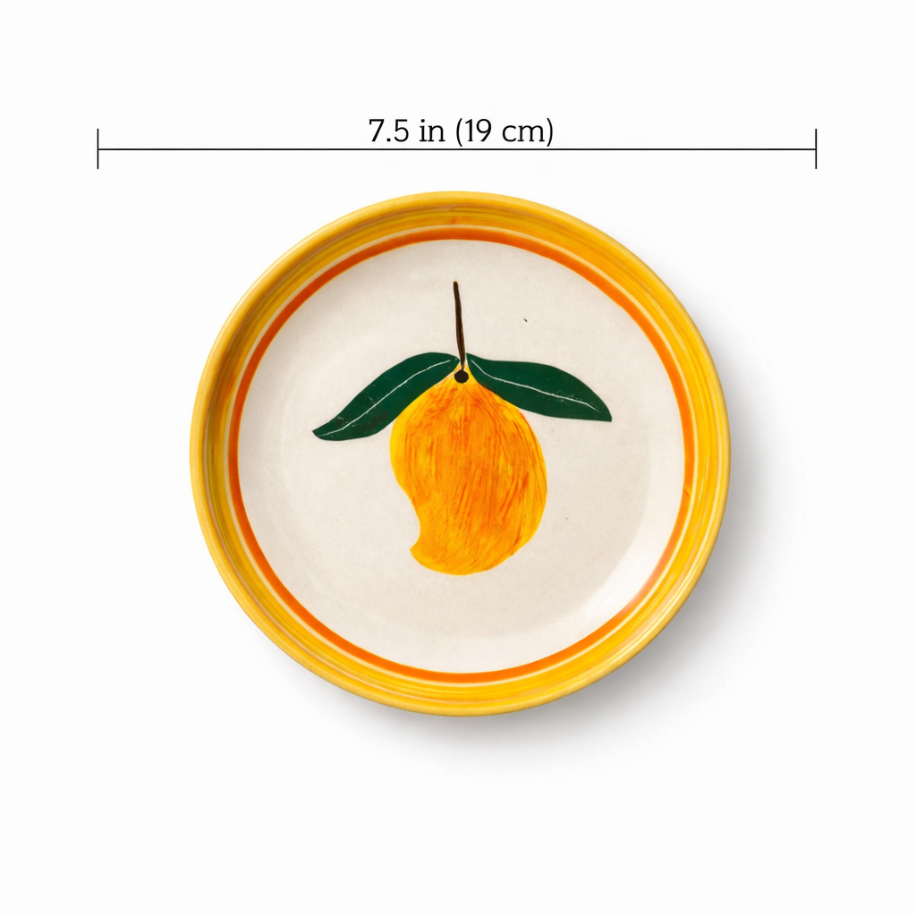 Ceramic plate with a lemon design and yellow rim, showing measurement text.