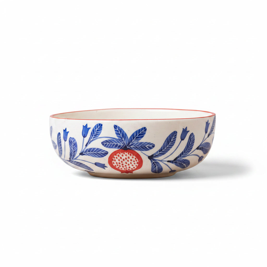 Anaar Bazaar ceramic bowl featuring an elegant hand-painted red pomegranate motif.