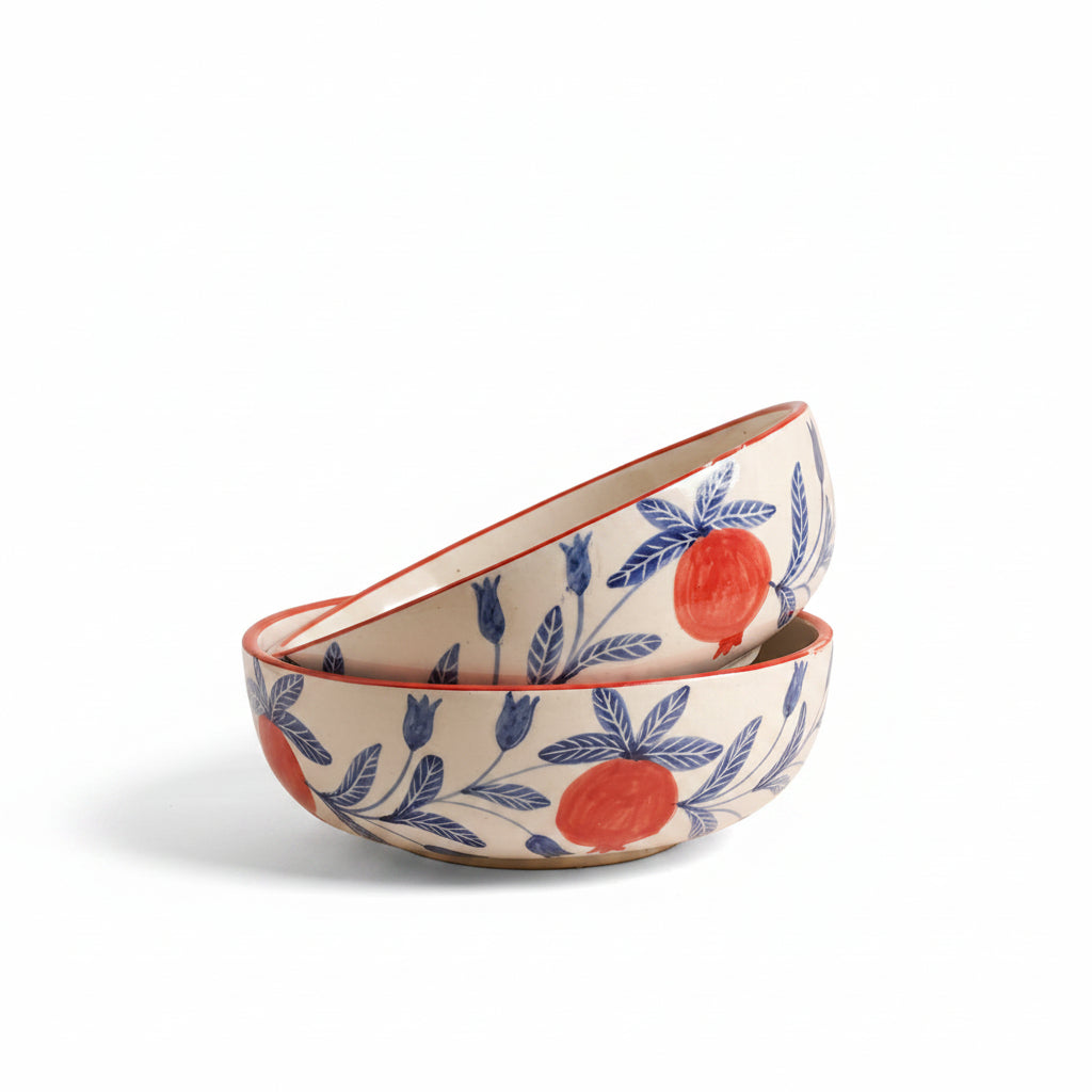 Anaar Bazaar ceramic bowl featuring an elegant hand-painted red pomegranate motif