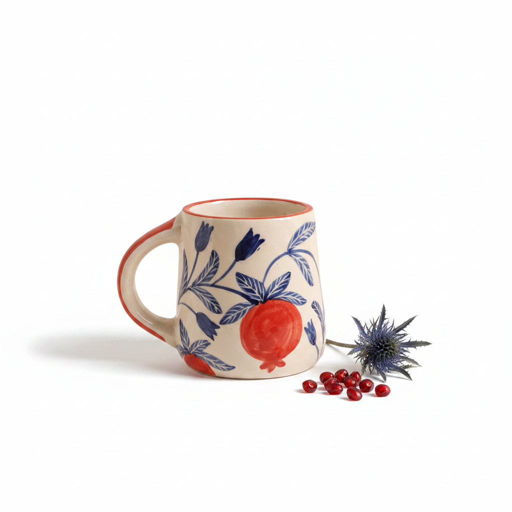 Anaar Bazaar ceramic coffee mug with vibrant red pomegranate and floral designs