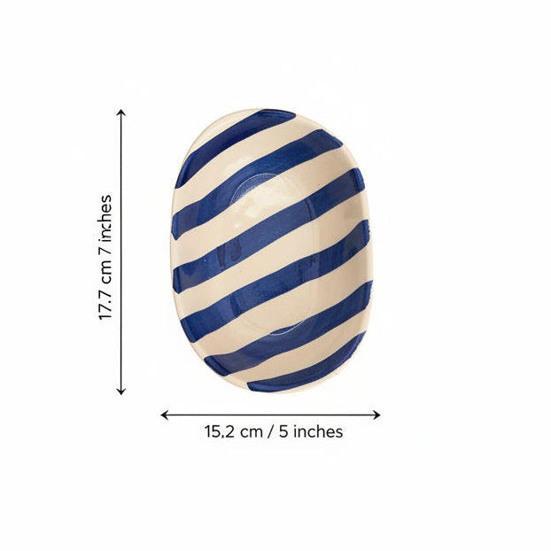 Blue and white striped ceramic plate with dimensions on a white background