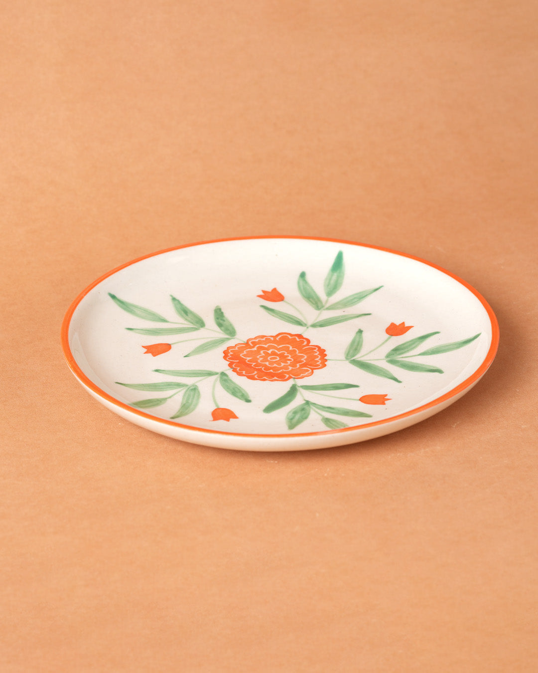 Decorative plate with floral design on a beige background