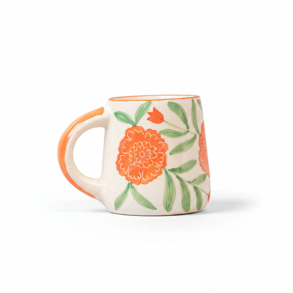 Marigold Mandi handpainted ceramic coffee mug decorated with bright orange and yellow marigold flowers