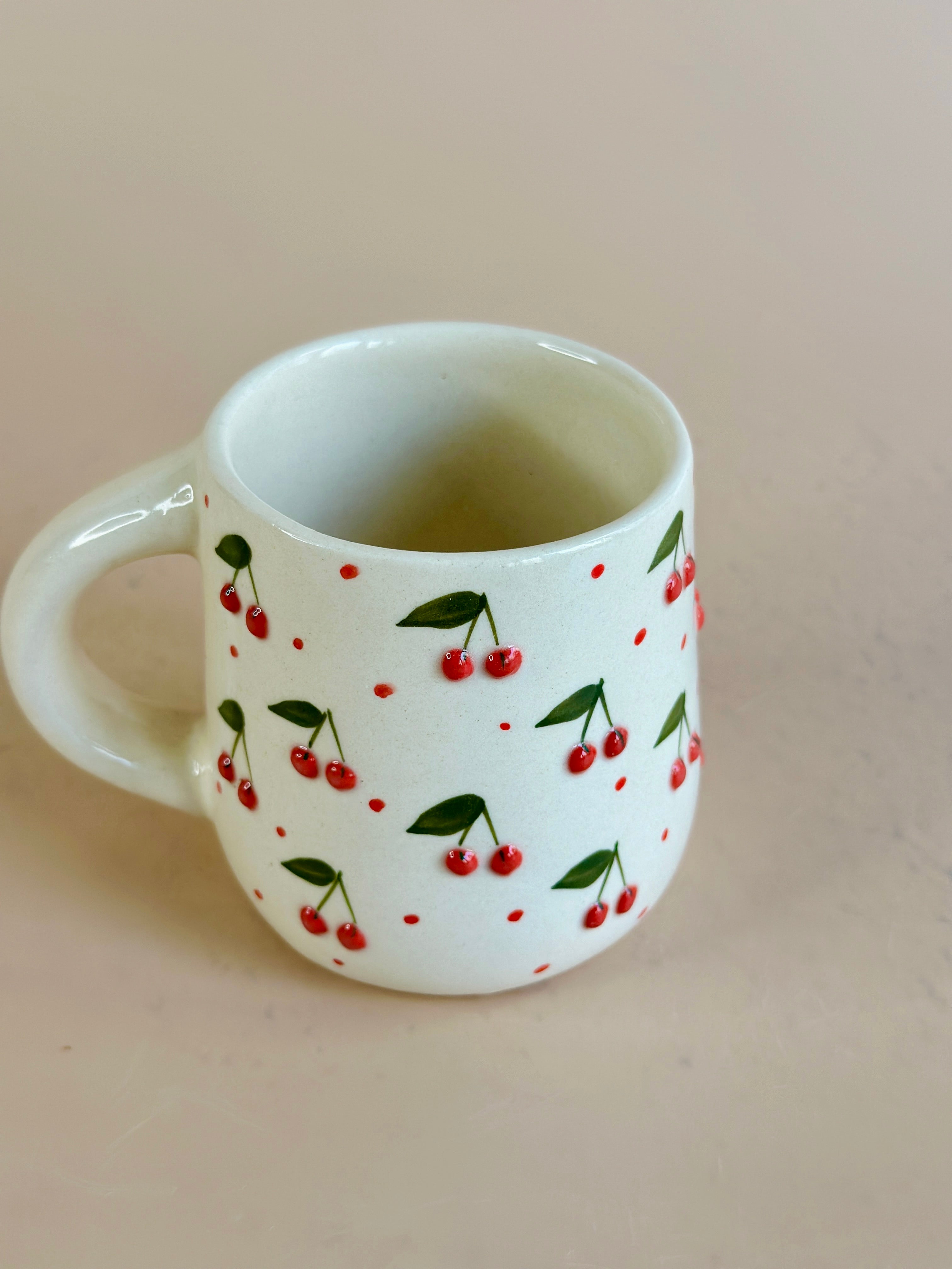 cherry embossed mug nurture india