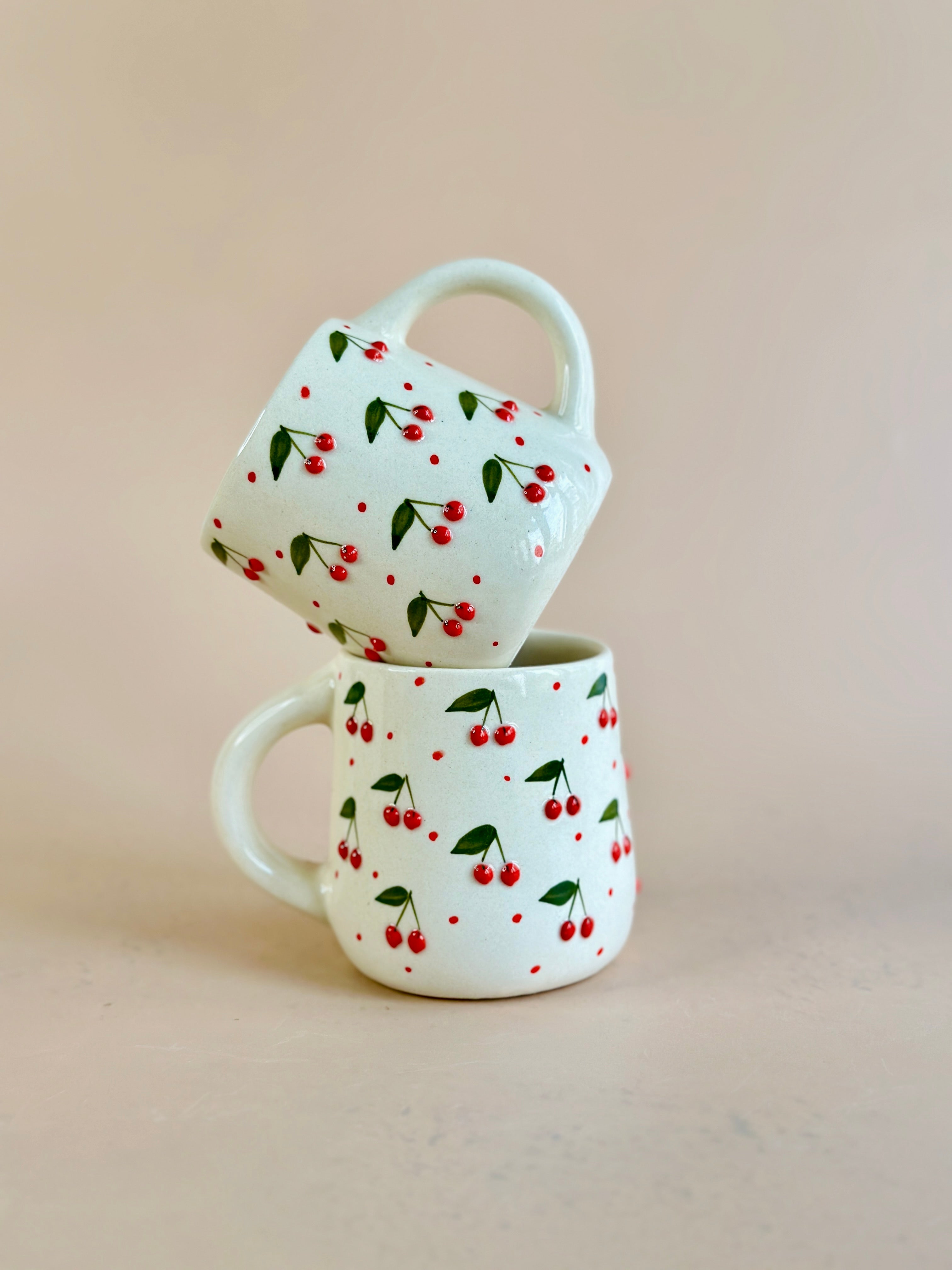 cherry mug embossed nurture india