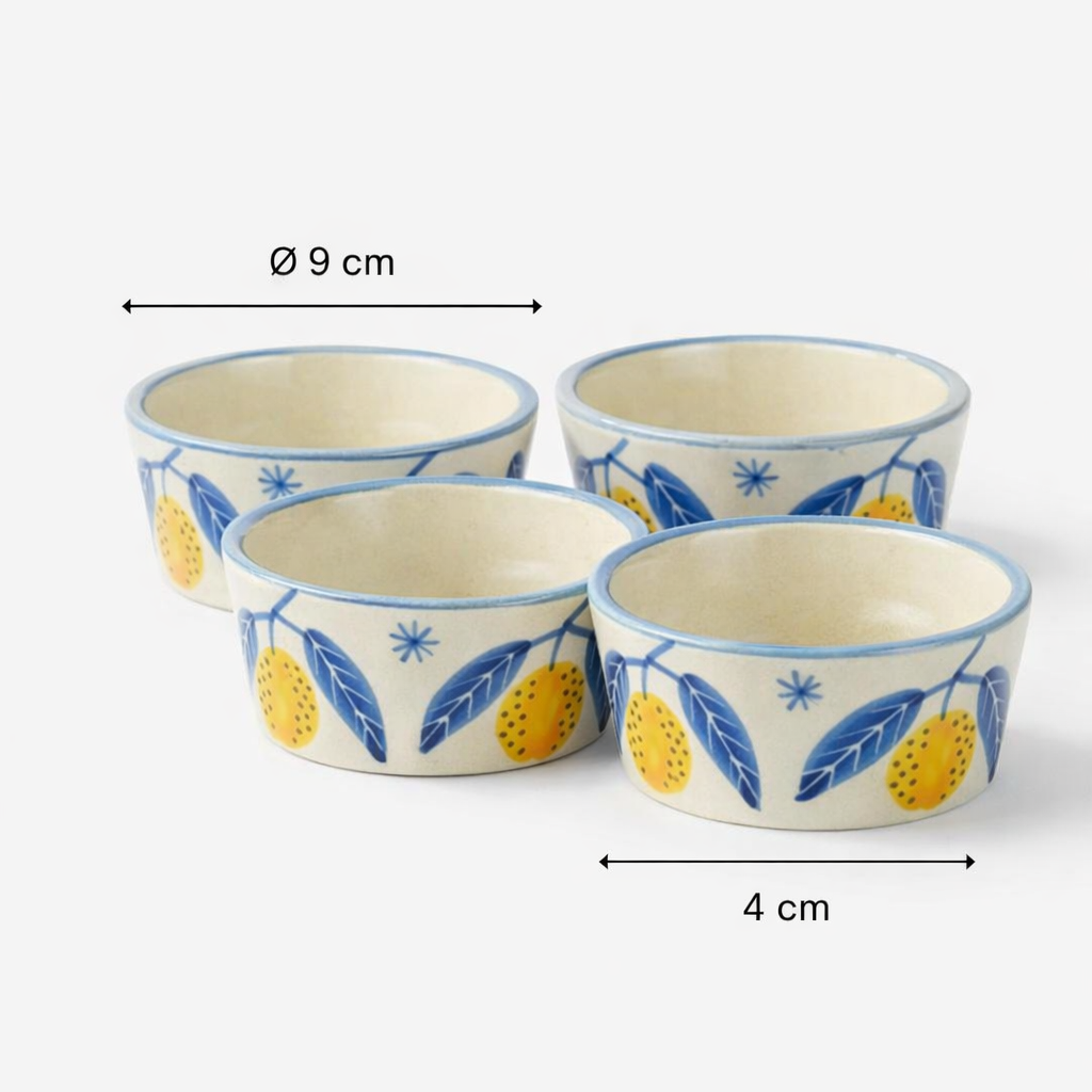 Set of four ceramic bowls with decorative patterns on a white background