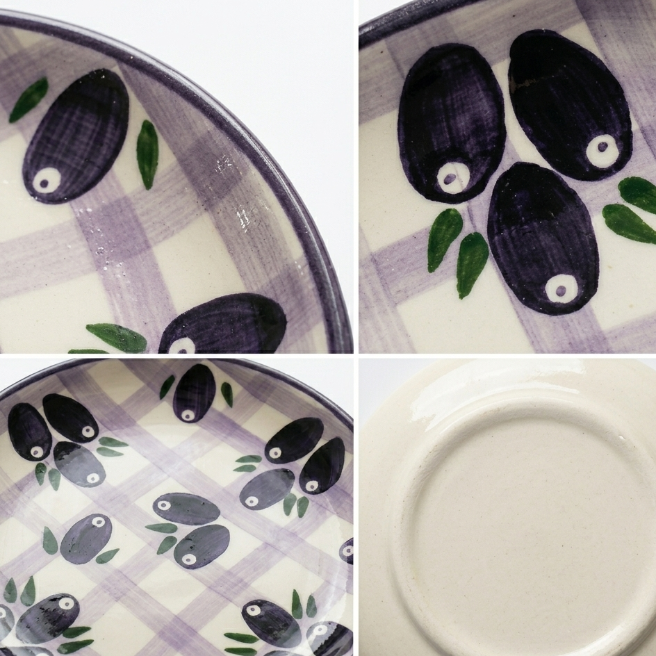 Ceramic plate with black olive design on a checkered background