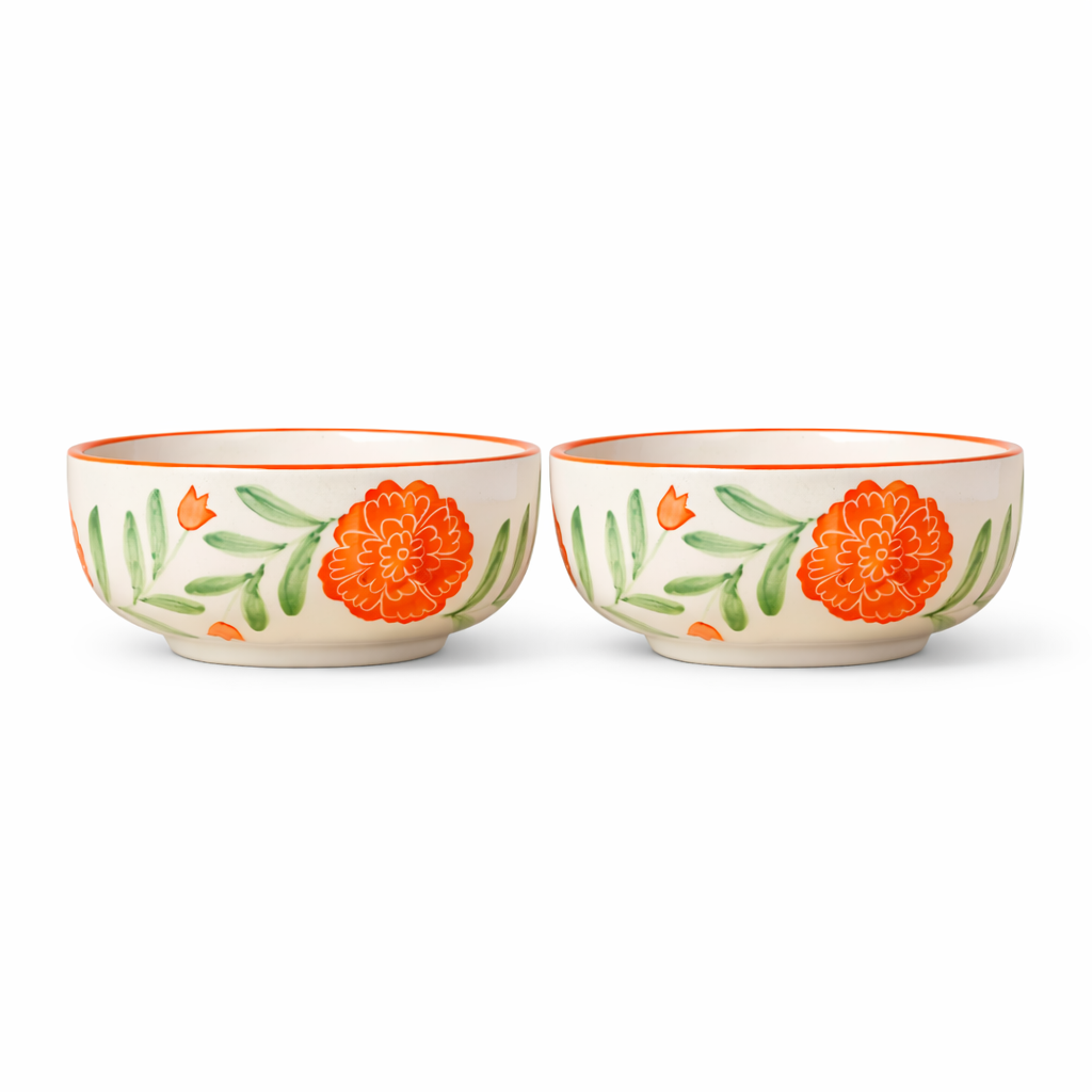 Two ceramic bowls with floral design on a white background