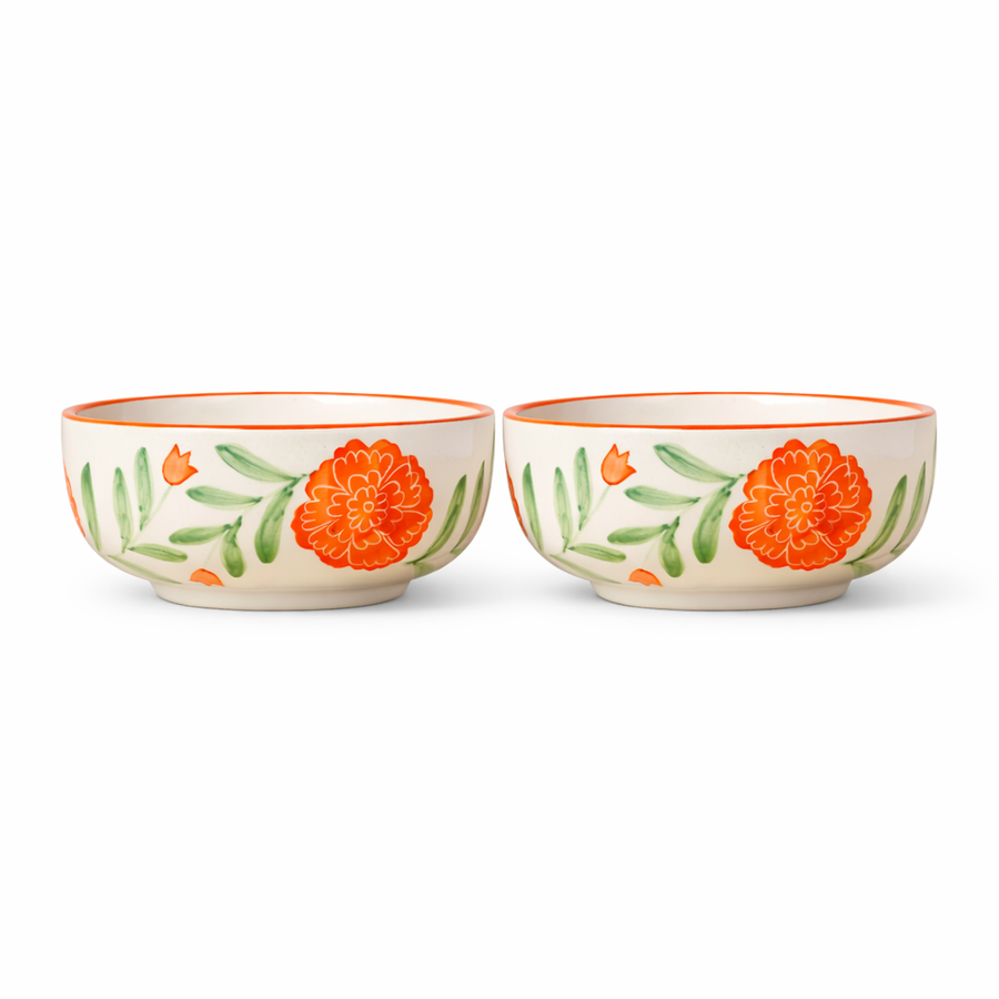 Two ceramic bowls with floral design on a white background