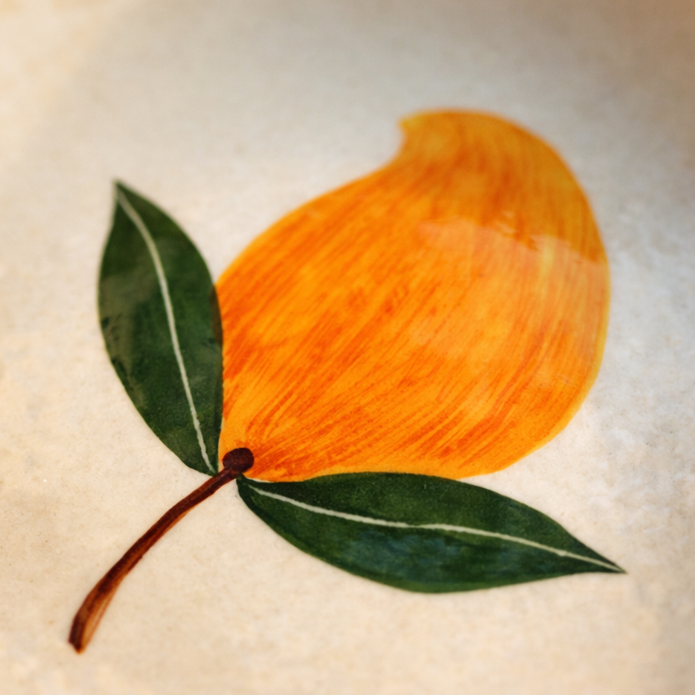 Hand-drawn illustration of a pear with leaves on a textured beige background