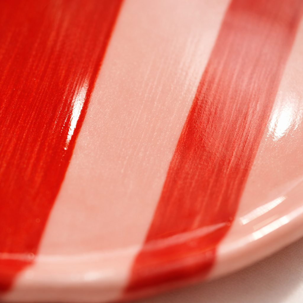 Close-up of red and pink striped fabric texture