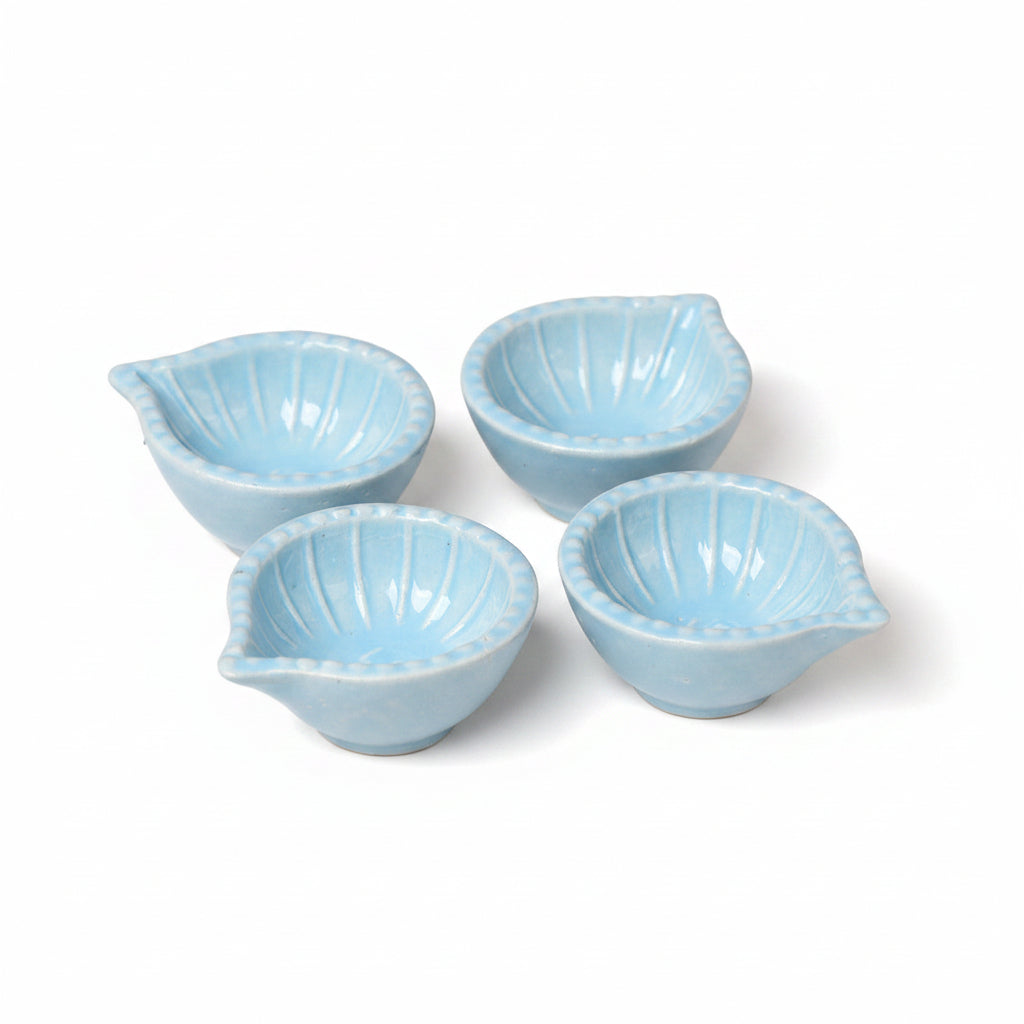 Sky Blue Swastik Clay Diyas - Set of 4