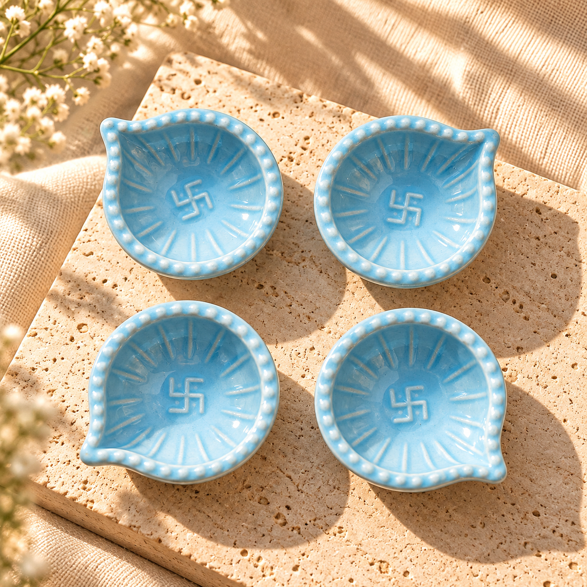 Sky Blue Swastik Clay Diyas - Set of 4