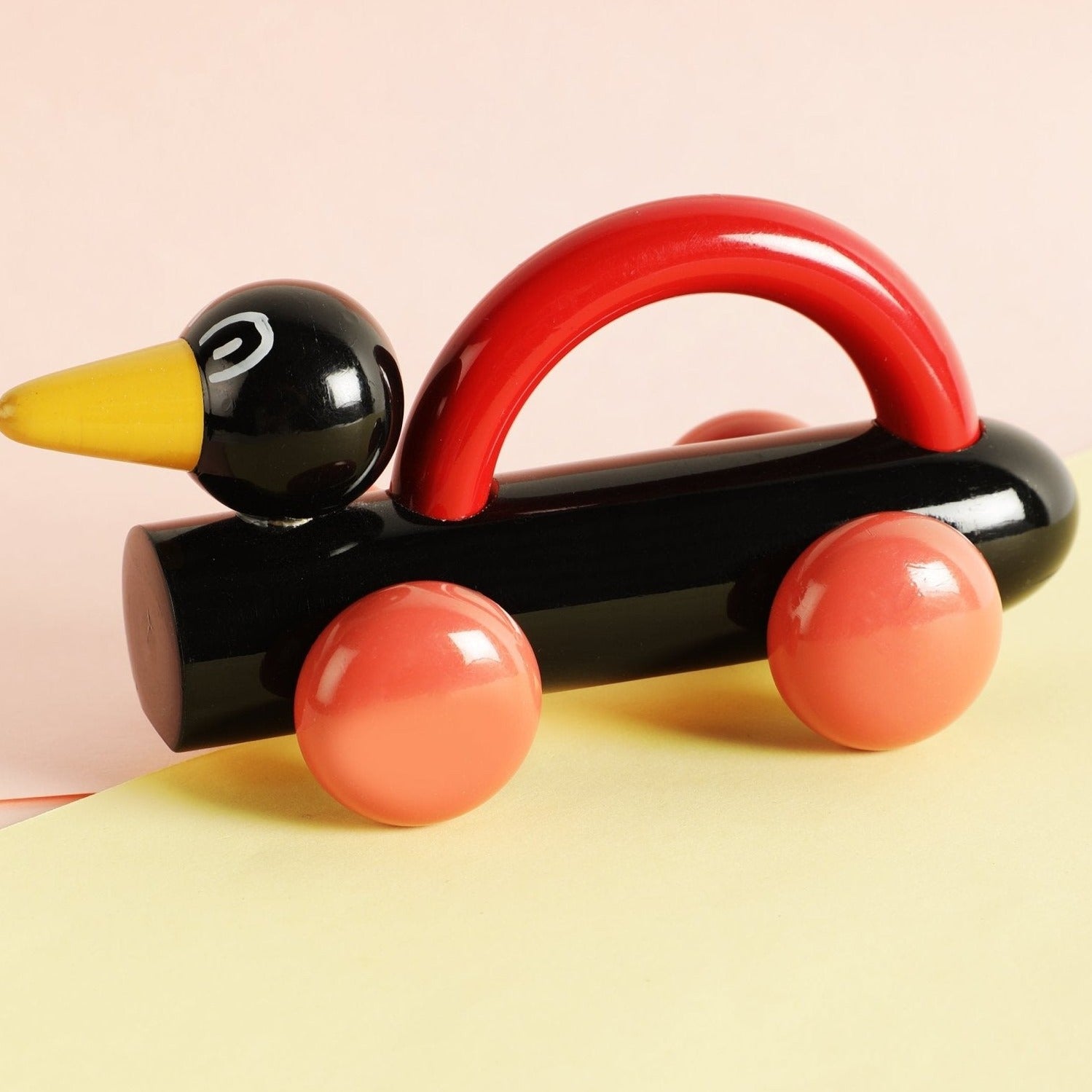 a toy car with a duck on top of it