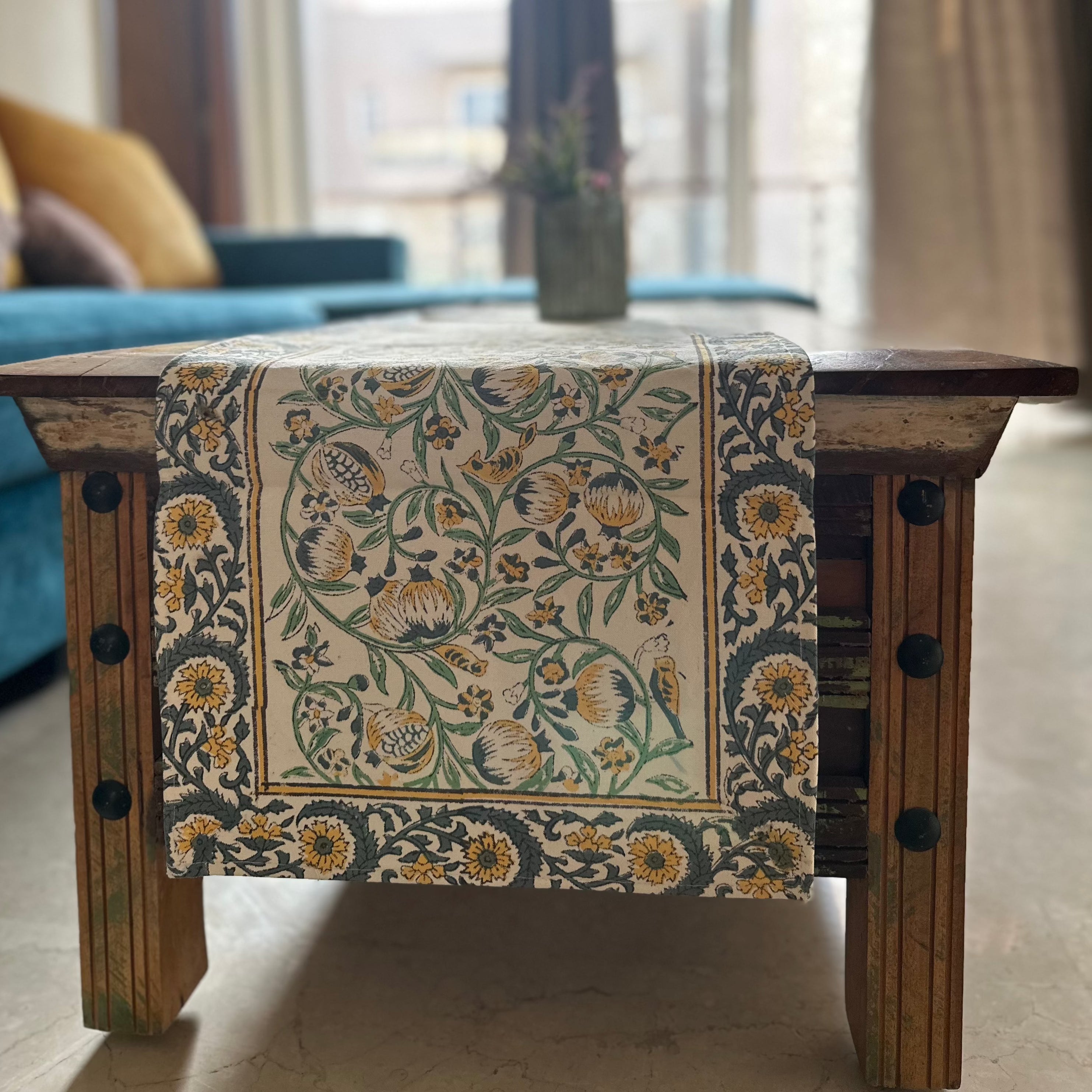 a wooden table with a floral design on it